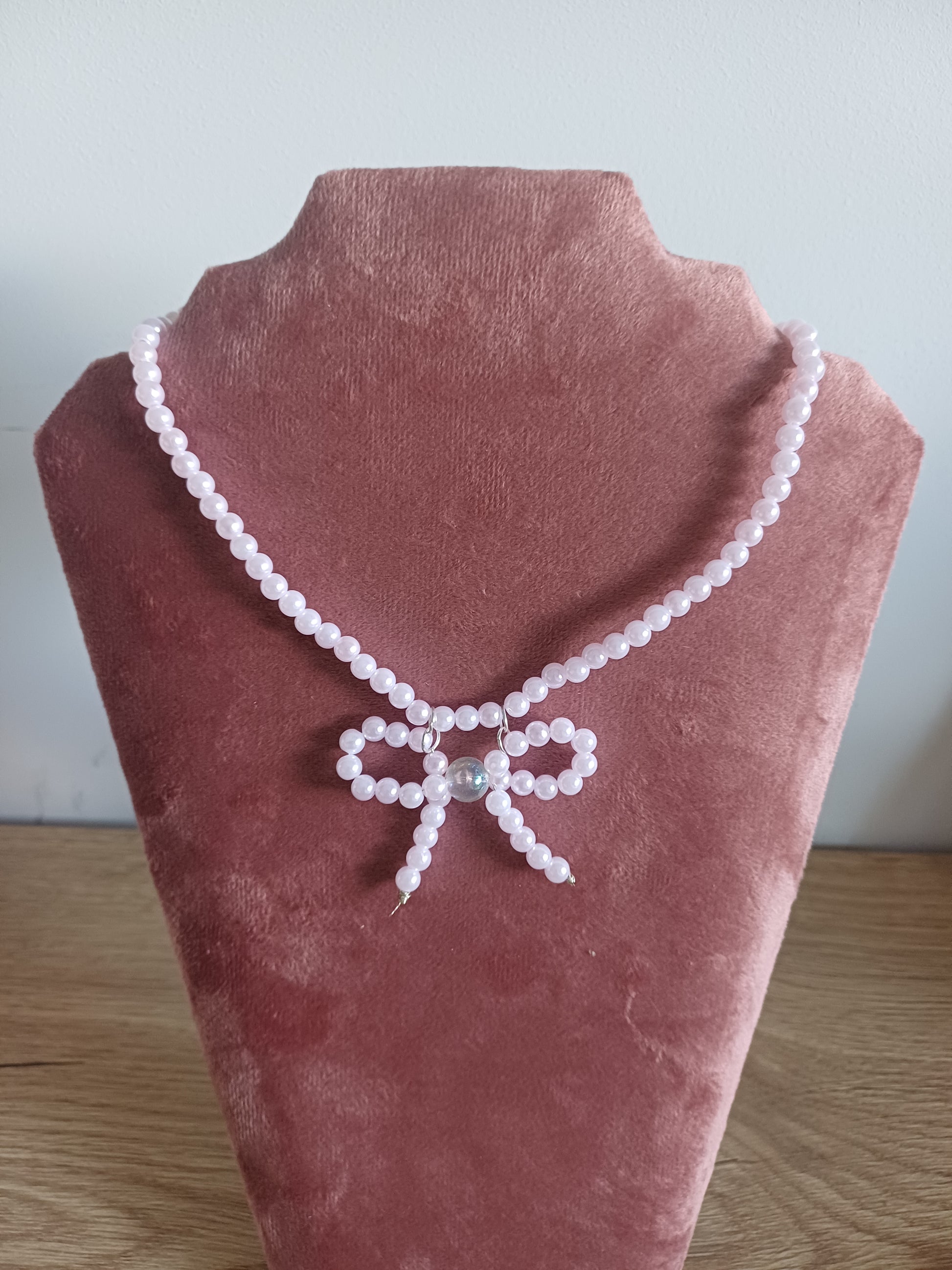 Parelstrik ketting roze
